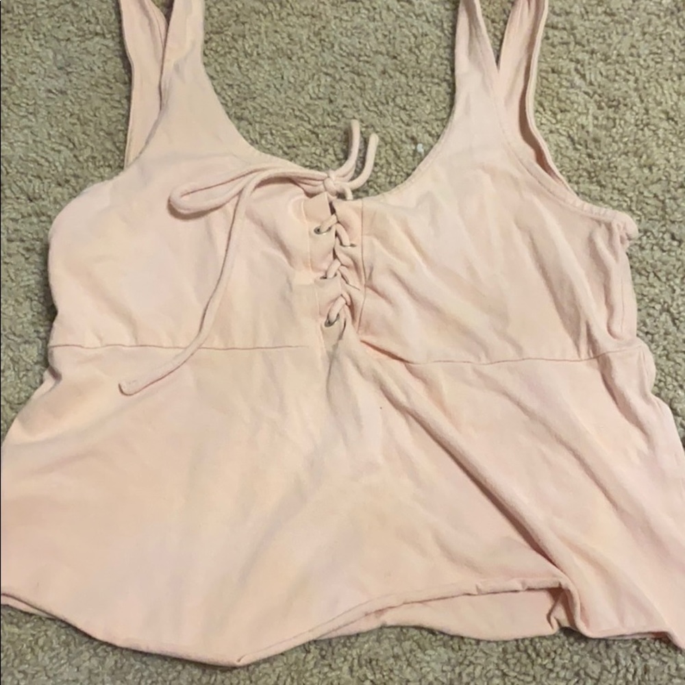 Pink cropped laced up tank top